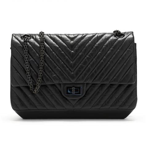 chanel 2.55 2022|Chanel quilted reissue shoulder bag.